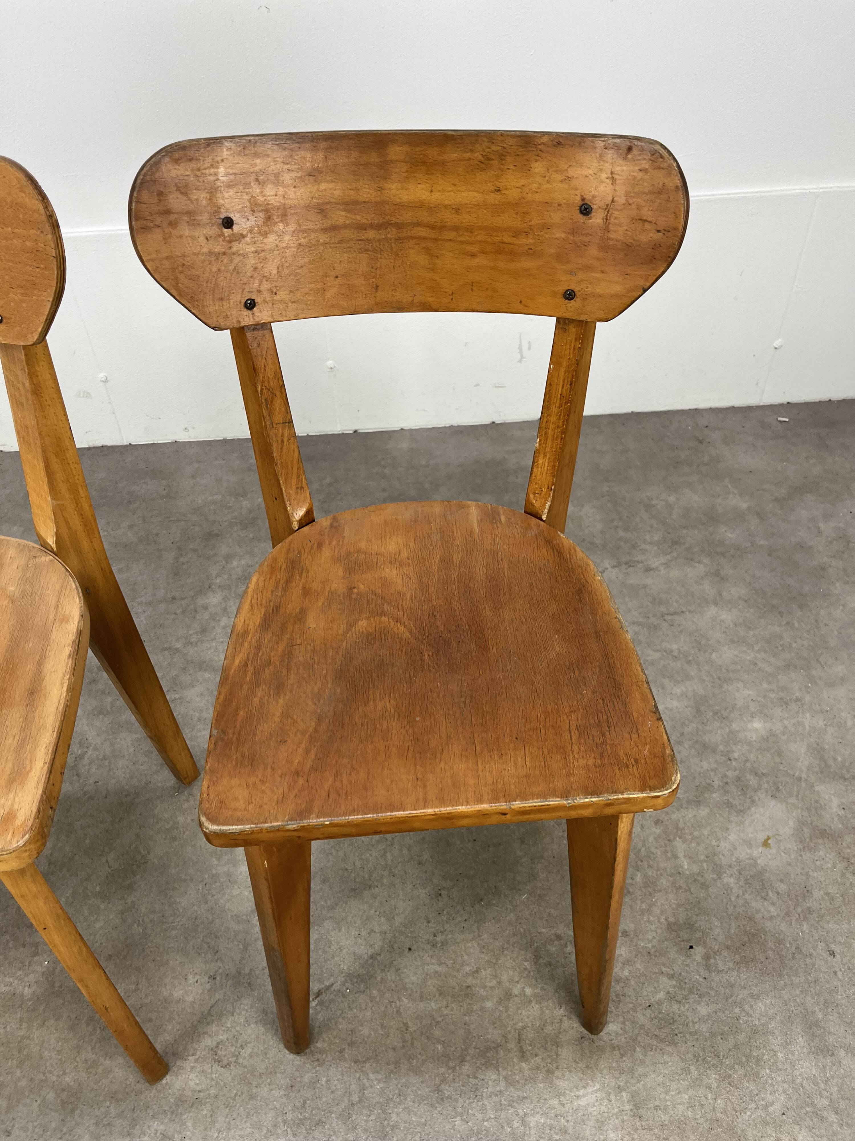 Pair of Luterma bistro chairs, wood, 1950s