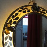 Round gold metal mirror, rose crown