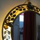 Round gold metal mirror, rose crown