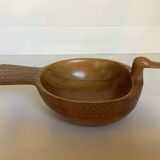 Carved wooden bird pocket