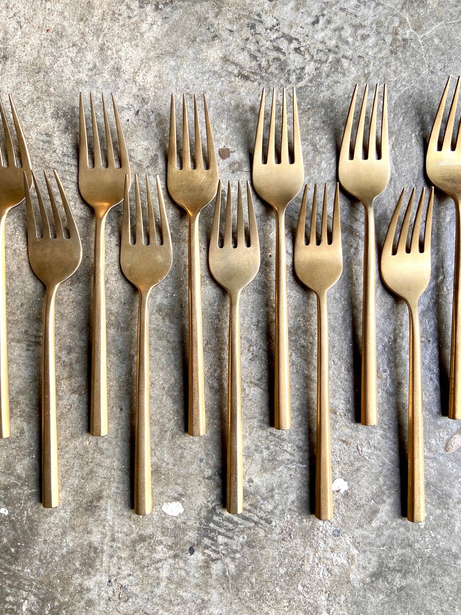 12 gilded bronze forks
