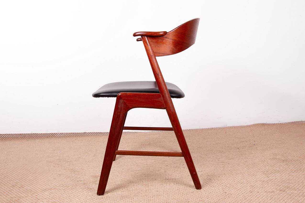 Danish armchair in teak and Skai, by Henning Kjaernulf for Korup Stolefabr.