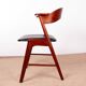 Danish armchair in teak and Skai, by Henning Kjaernulf for Korup Stolefabr.