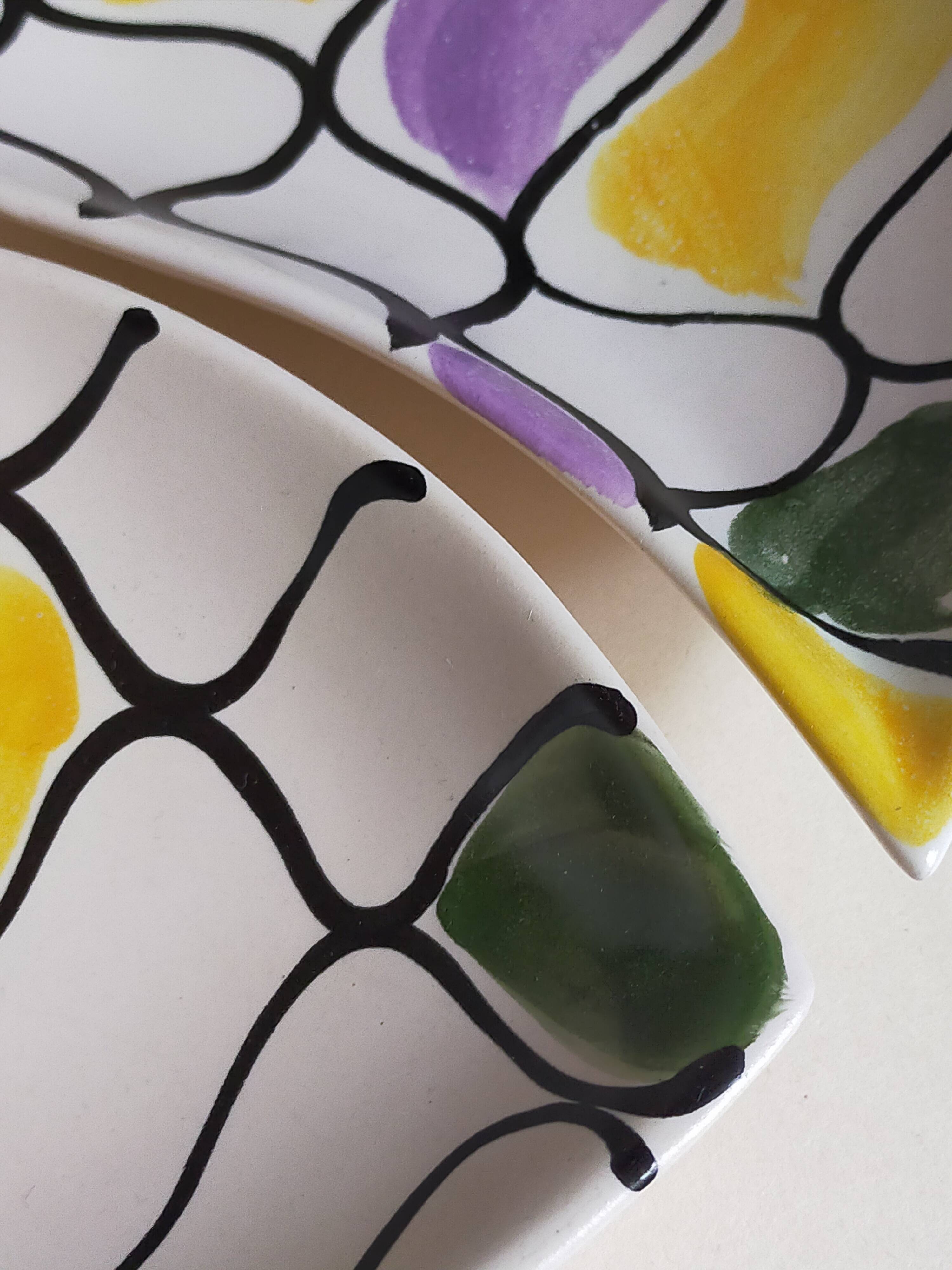 Three vintage free-form ceramic ravine dishes from the 1950s