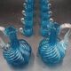 Cabaret Portieux liqueur service with 10 blue and clear glasses.