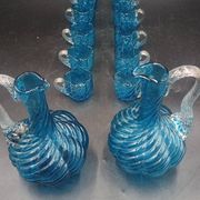 Cabaret Portieux liqueur service with 10 blue and clear glasses.
