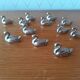 Set of 12 place-marked swans with names