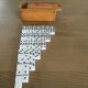 Jeu de dominos anciens dans sa boite en bois