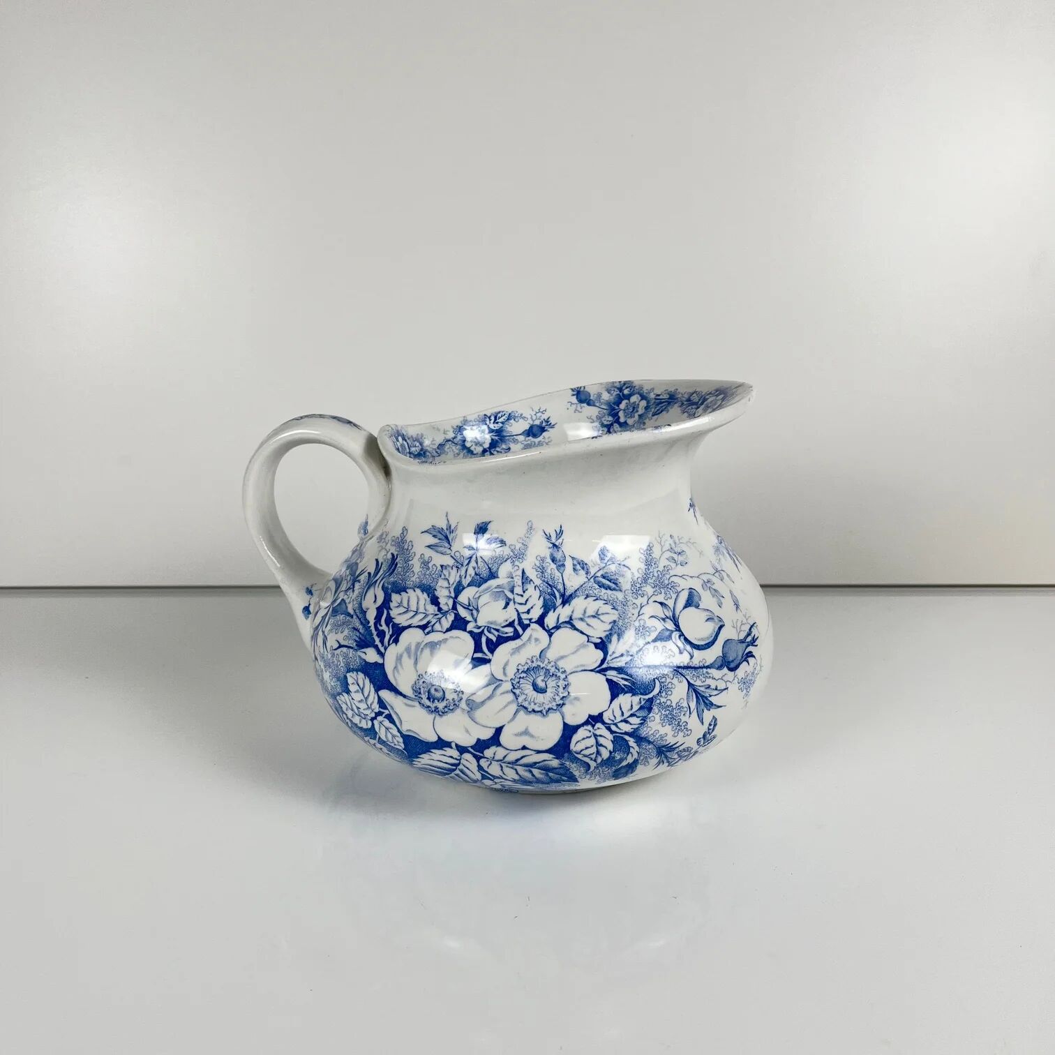 Chubby pitcher, old toilet jug KG Lunéville, blue flower pattern, late 19th to early 20th century.