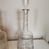 Pair of antique moulded glass decanters