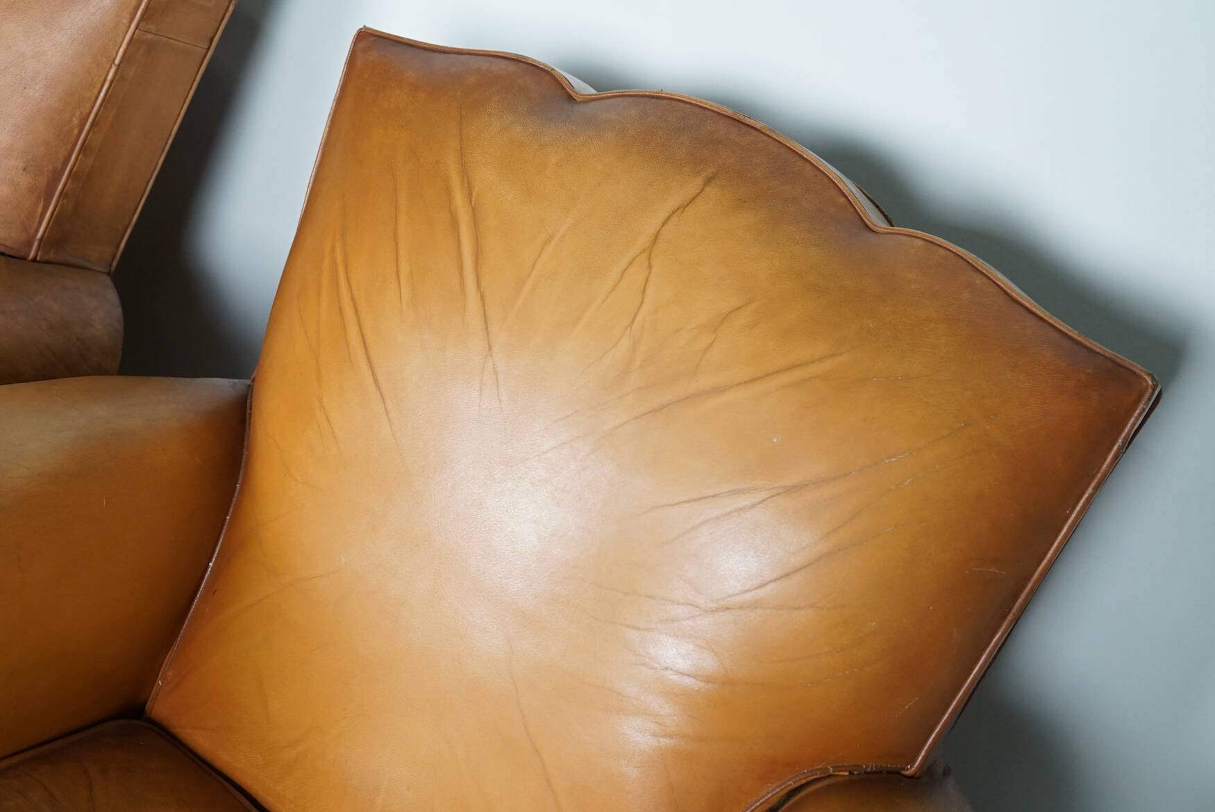 Pair of French Cognac Moustache Back Leather Club Chairs, 1950s