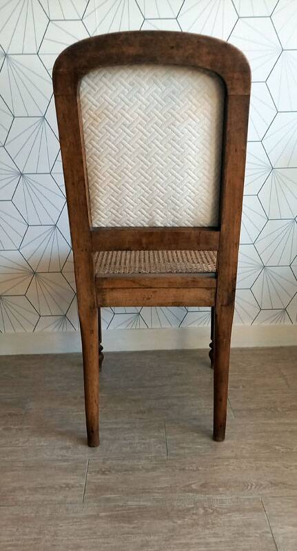 Solid oak art deco chair with cane and fabric.