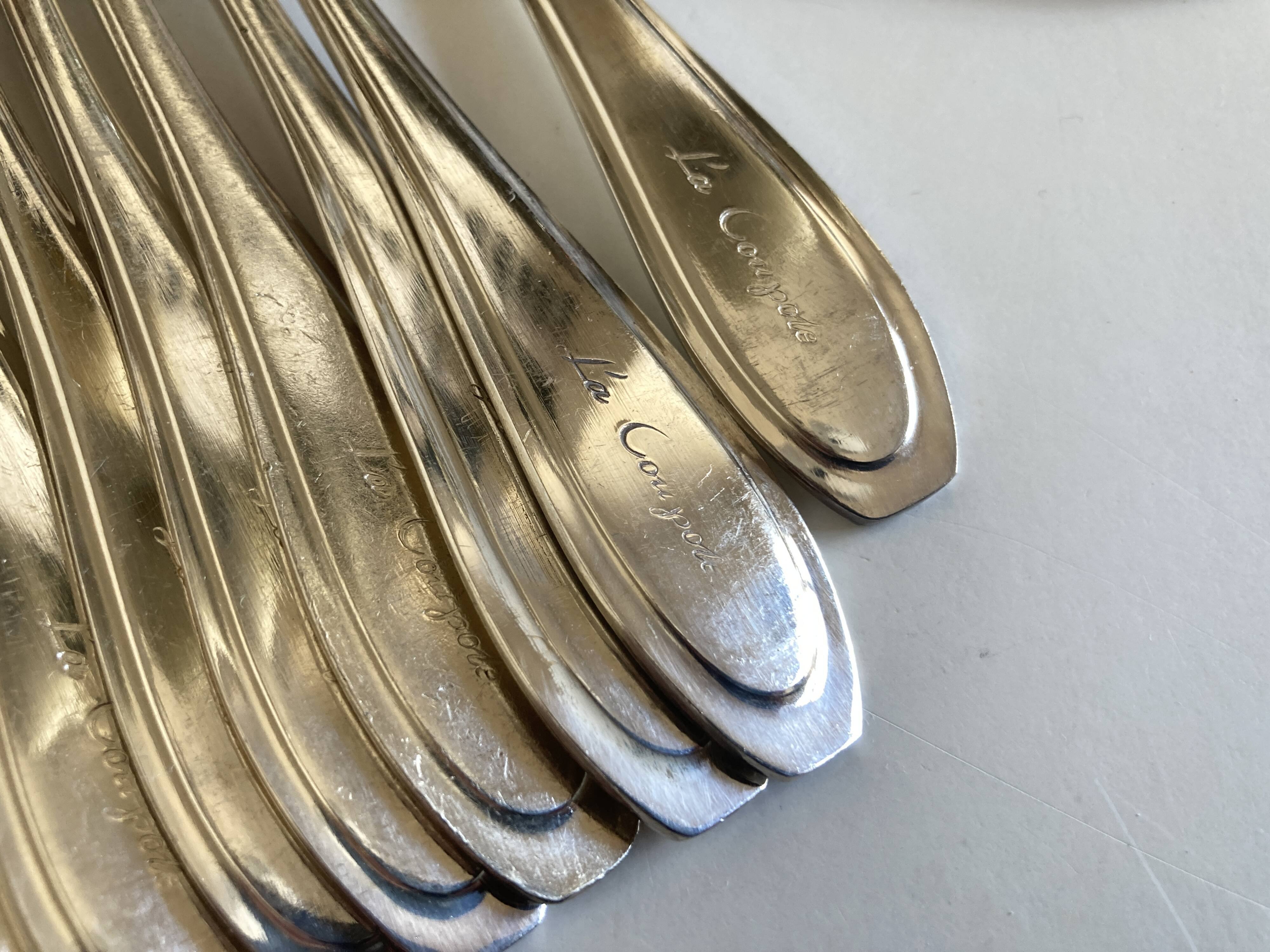 Set of 12 knives and 12 forks of brasserie La Coupole 1970