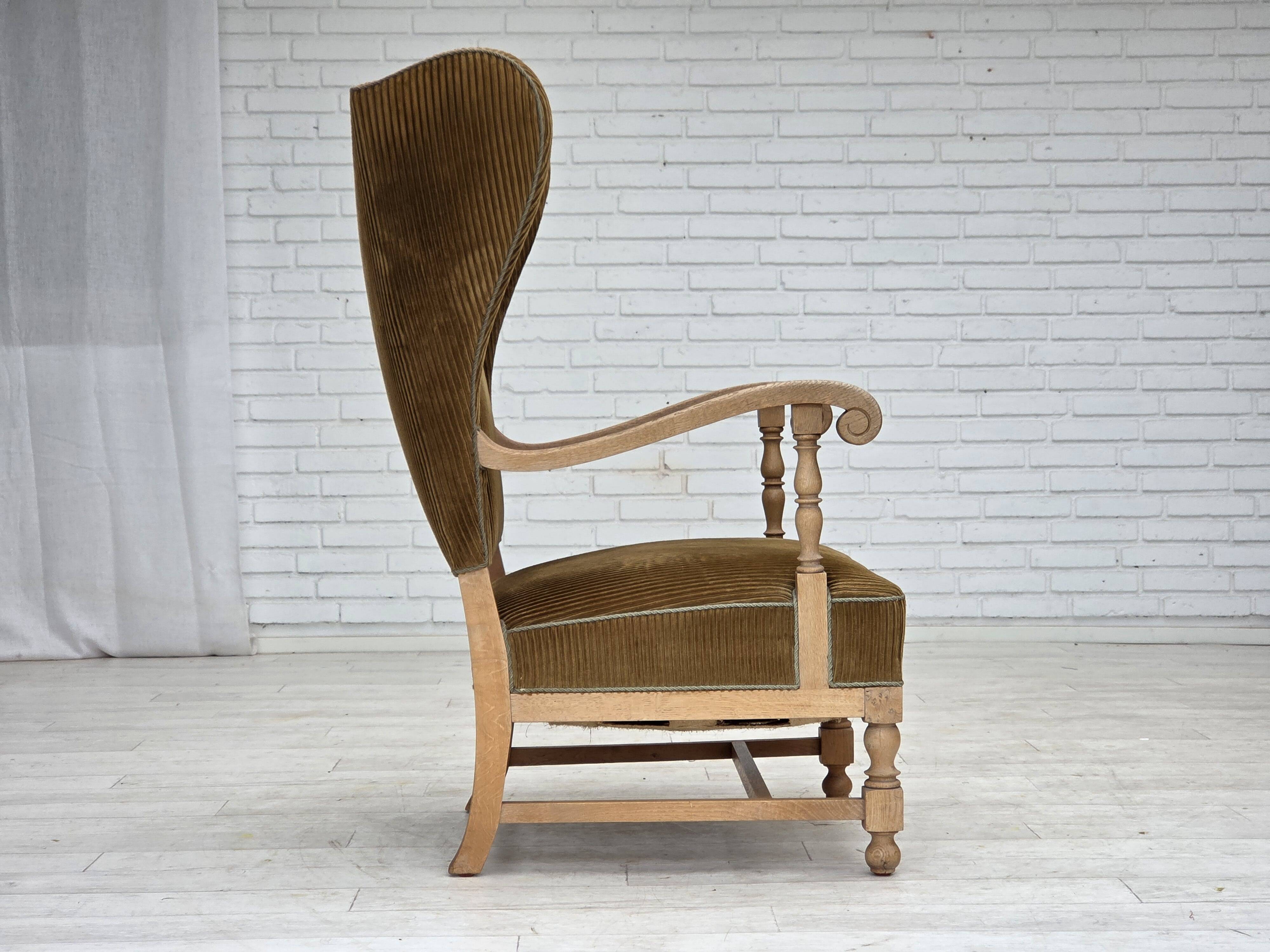 1970s, Scandinavian highback armchair, furniture corduroy, carved oak wood.