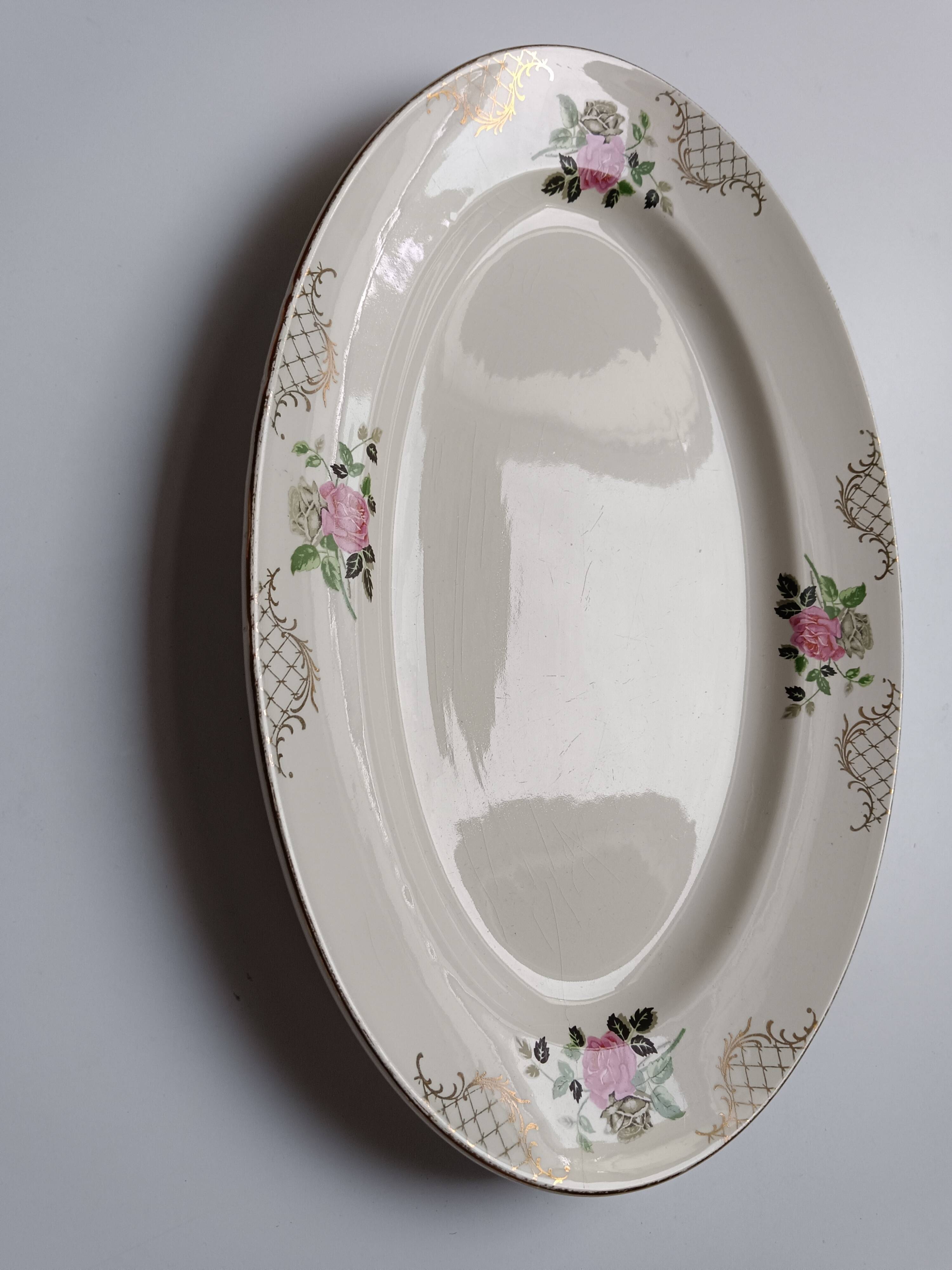 Oval plate Sarreguemines cream with pink gilding, antique.