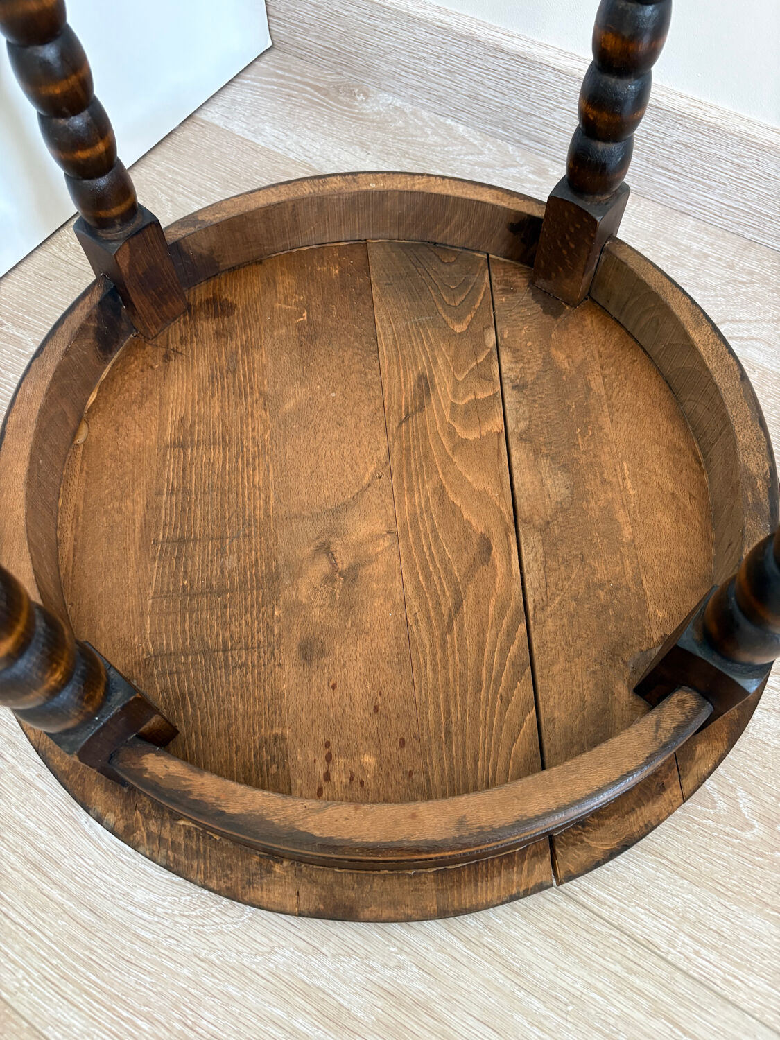 Antique turned wooden side table with authentic charm.