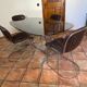 Oval table. 1970. Steel and smoked glass. 180x100