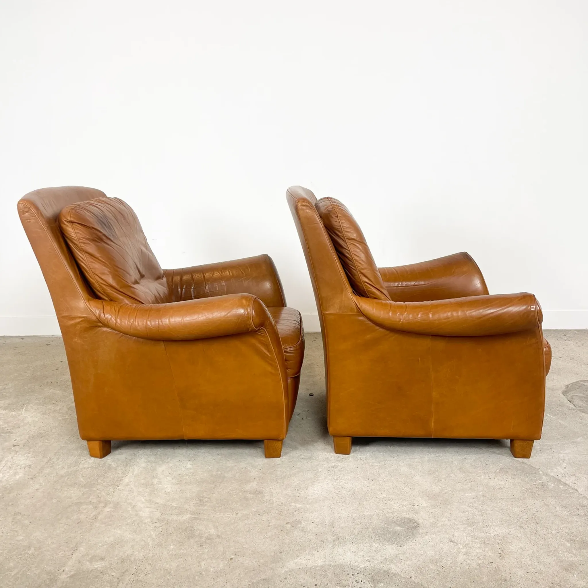 Ensemble de 2 fauteuils en cuir cognac vintage
