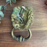 Bronze lion door knocker
