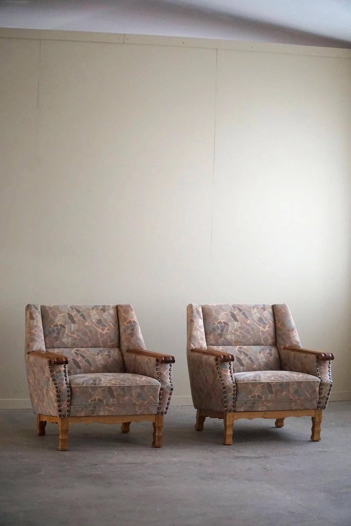 Mid-century modern Danish, pair of oak armchairs with original fabric, 1960s.