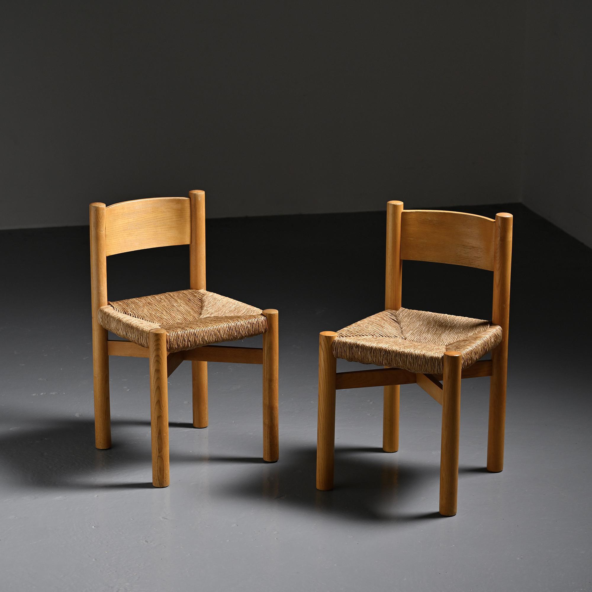 Pair of Méribel chairs by Charlotte Perriand, circa 1955.