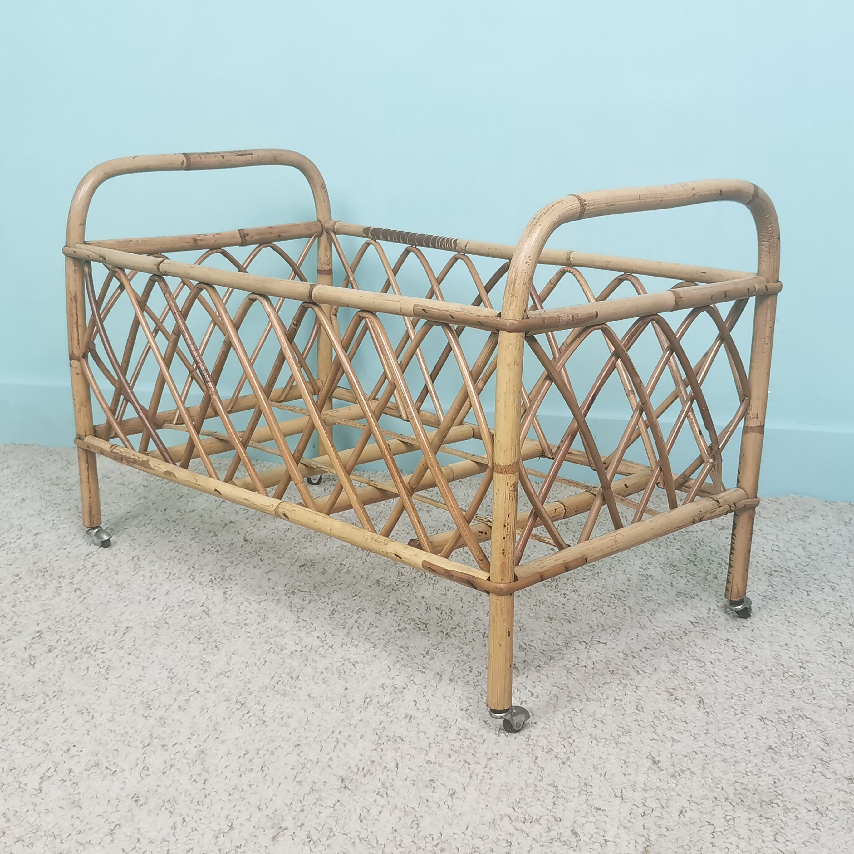 Rattan doll bed