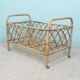 Rattan doll bed