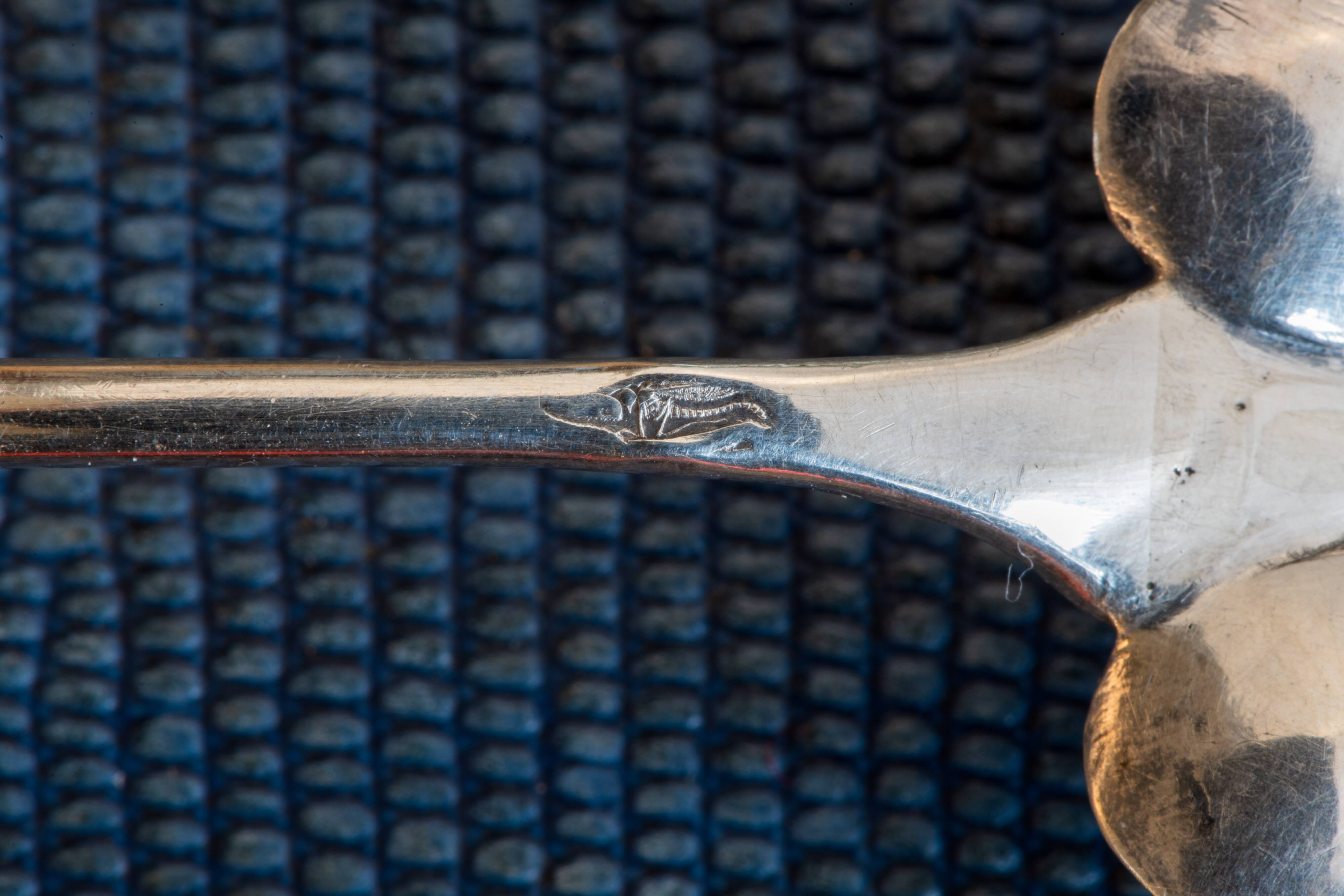 Solid silver spoon shaker