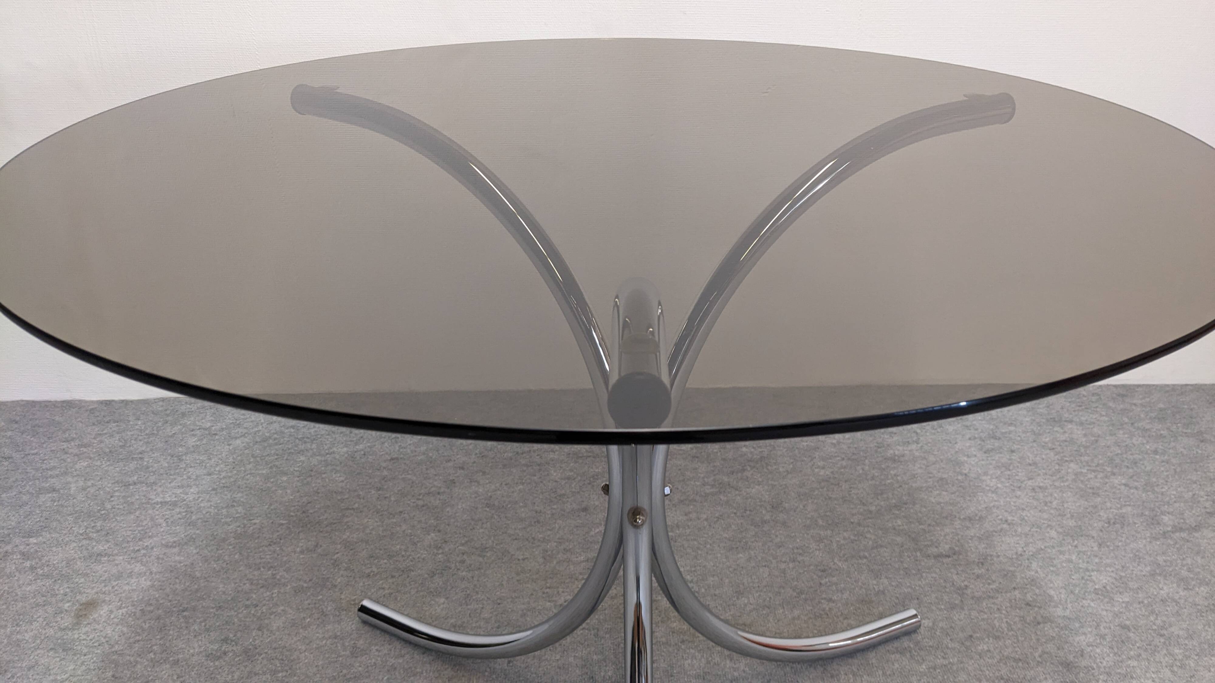 Chrome metal and smoked glass round table, Italy circa 1970.
