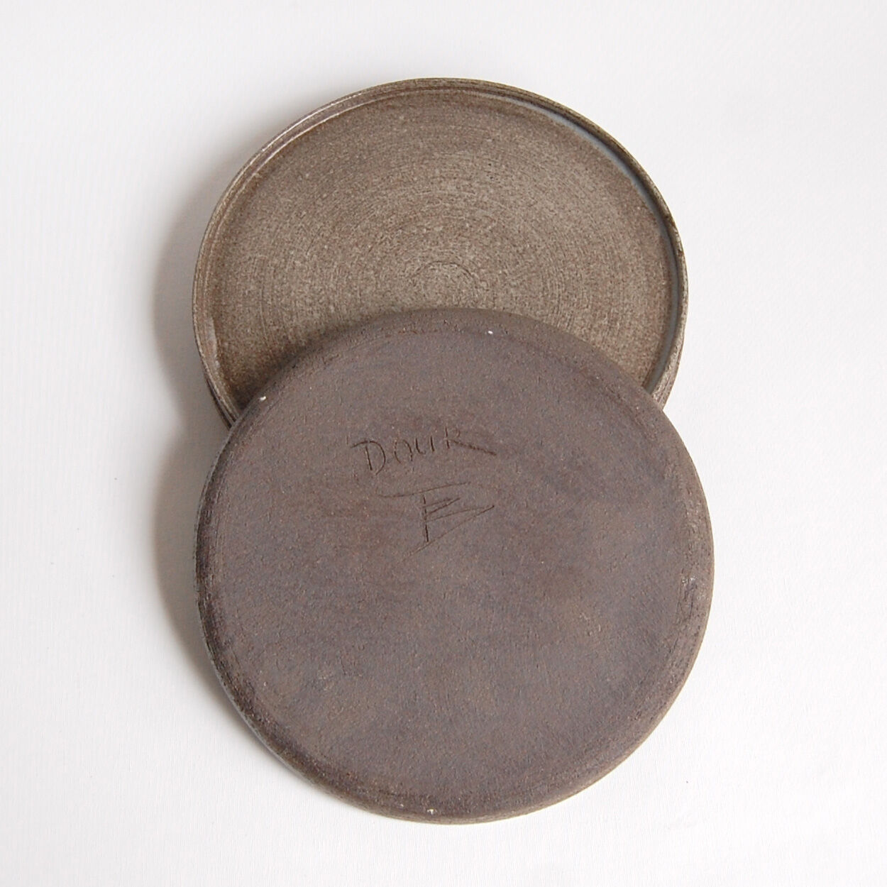 Set of 4 bowls and 4 plates by Thèrèse Bataille for the workshop of Dour 1970s