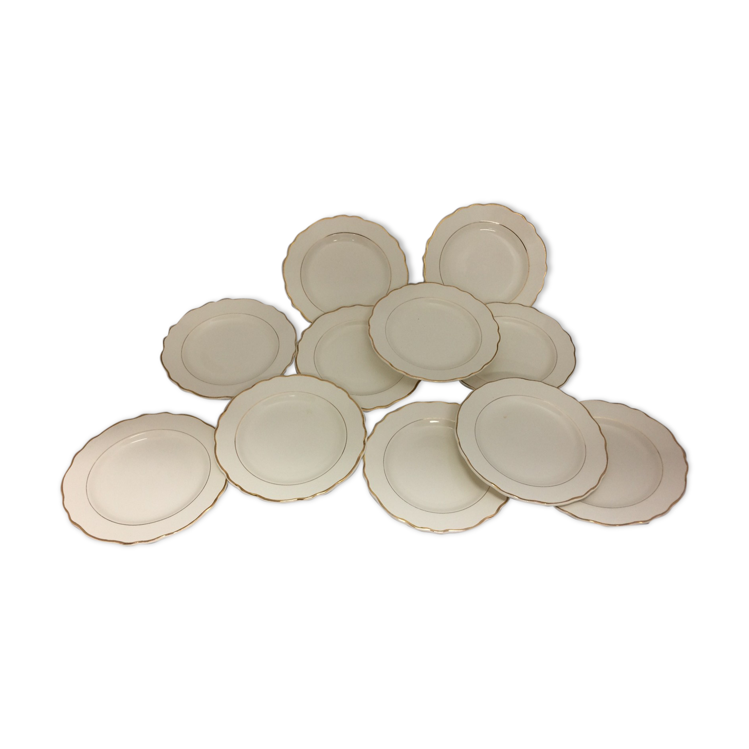 Old dessert plates in salins France earthenware