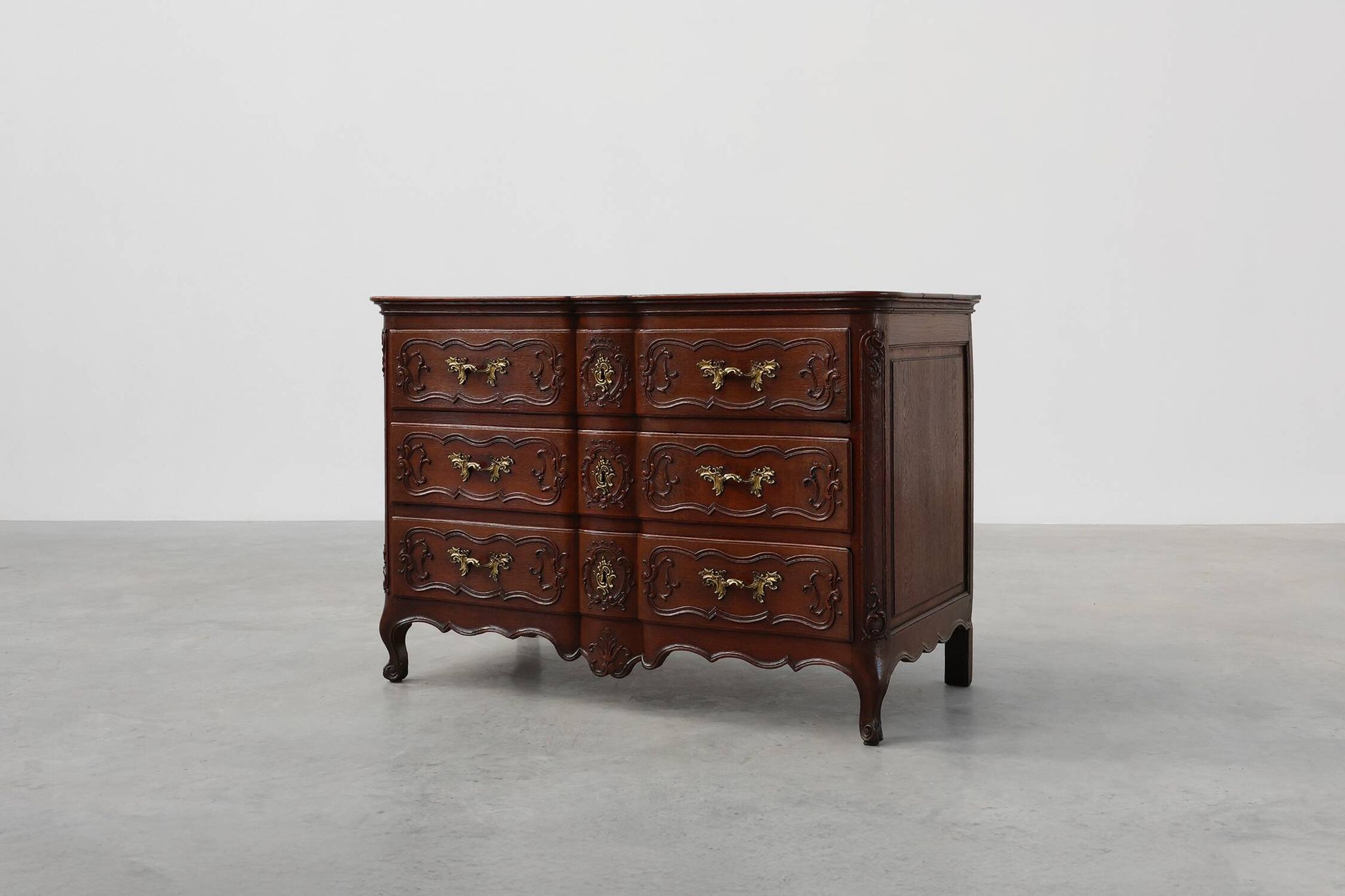 French 18th Century hand crafted oak chest of drawers in Louis XV style