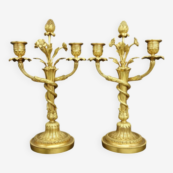 Large pair of intertwined Louis XVI style candlesticks from the 19th century - bronze
