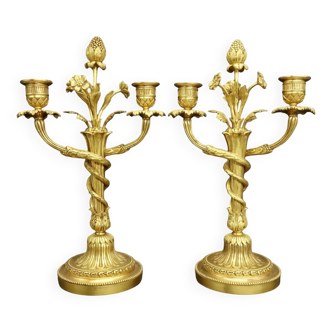 Large pair of intertwined Louis XVI style candlesticks from the 19th century - bronze