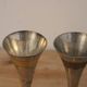 Set of 3 vintage silver-plated and gold footed cups.