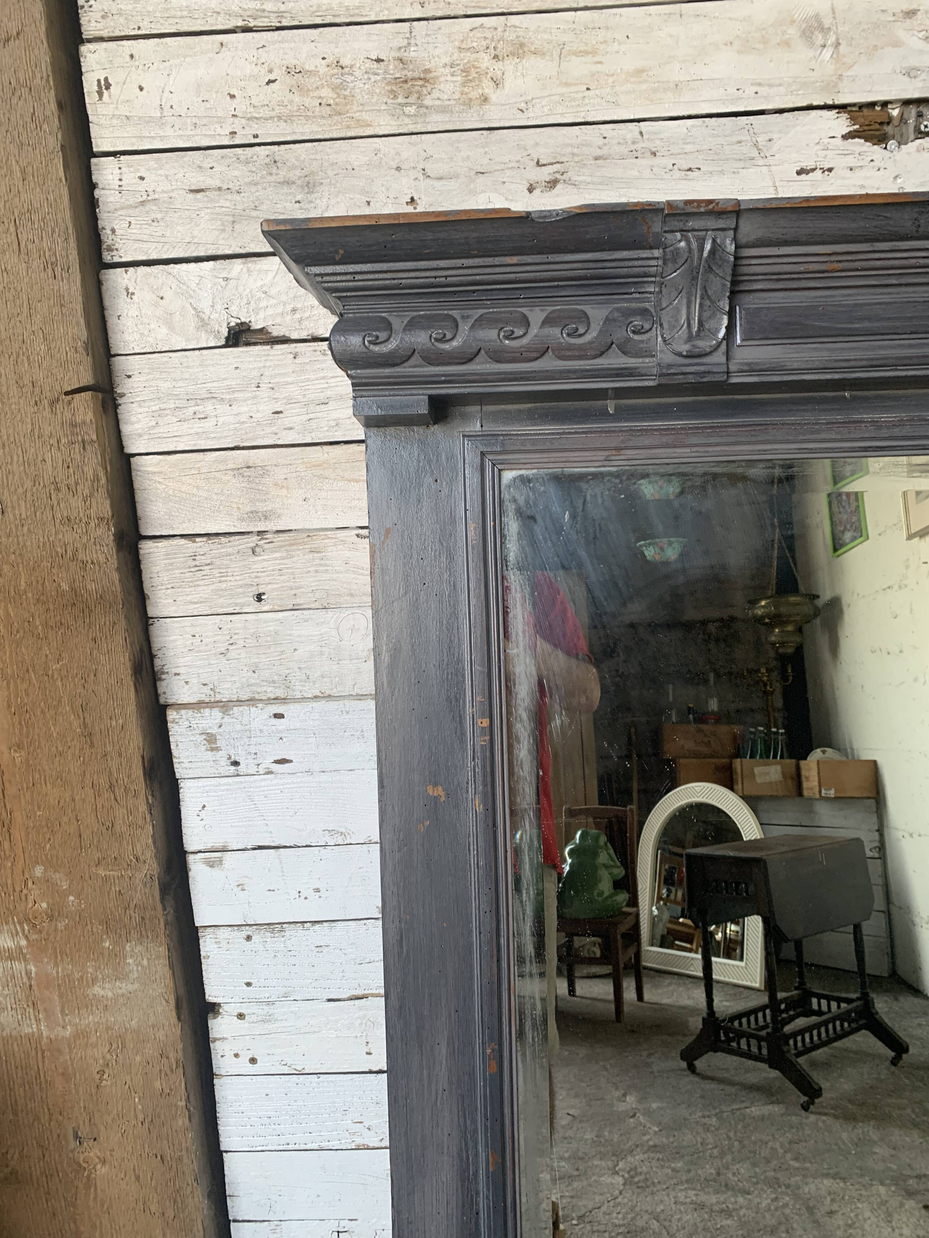 Wooden mirror with juice patina