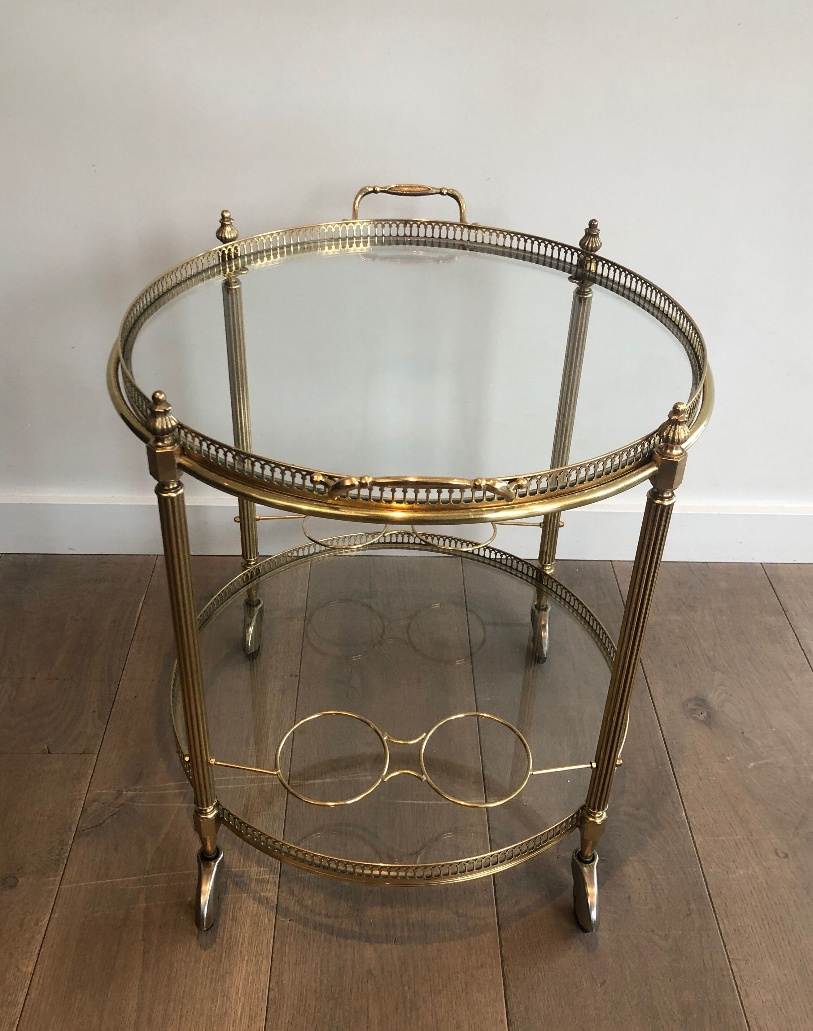 Neoclassical style rolling table in brass