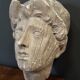 Antique plaster sculpture of a female face from the early 20th century