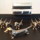 Series of 12 vintage dachshund knife holders in silver metal