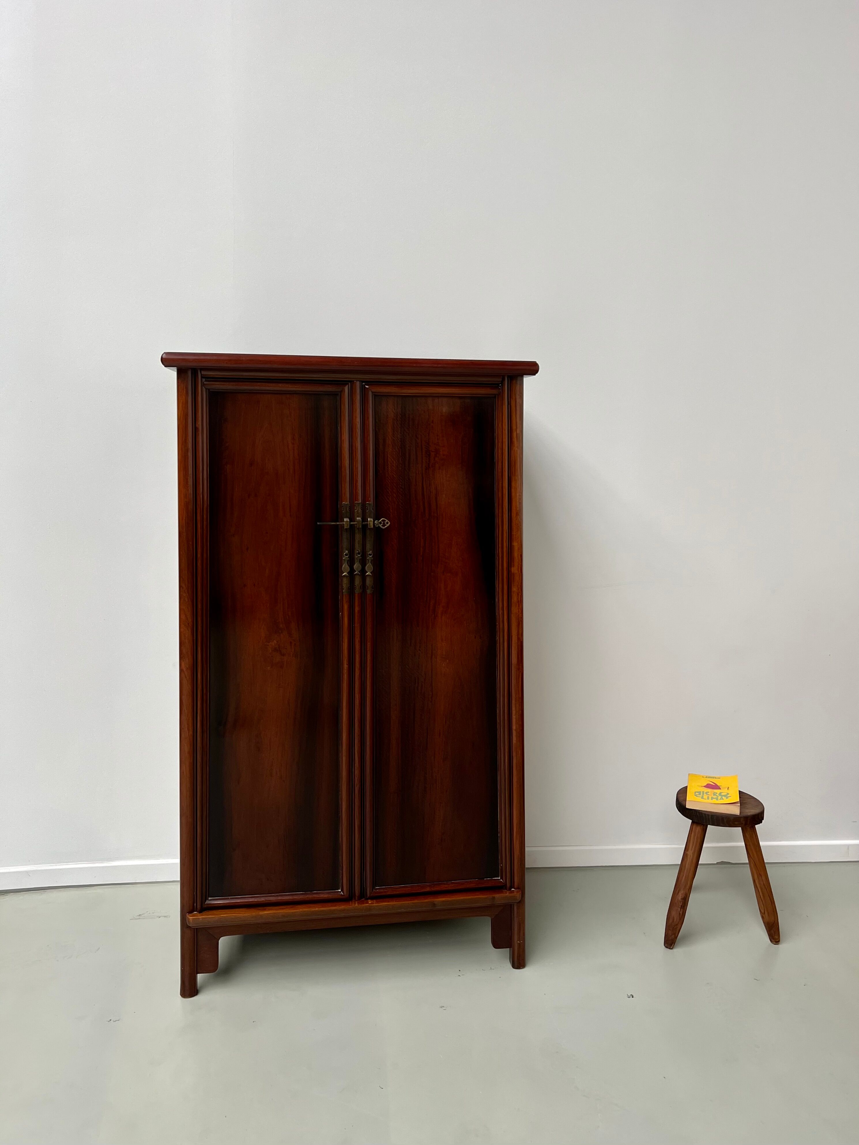 Chinese trapezoidal roller cabinet, made of rosewood.