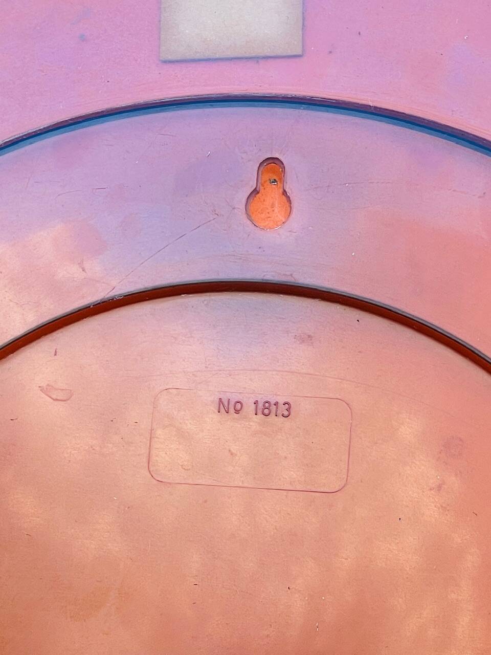 Vintage round smoked plastic mirror, circa 1970s.