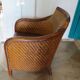Woven rattan armchair and exotic wood in colonial style, 1980s.