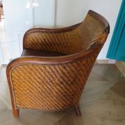 Woven rattan armchair and exotic wood in colonial style, 1980s.