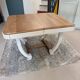 Restored oak table in natural wood and linen.