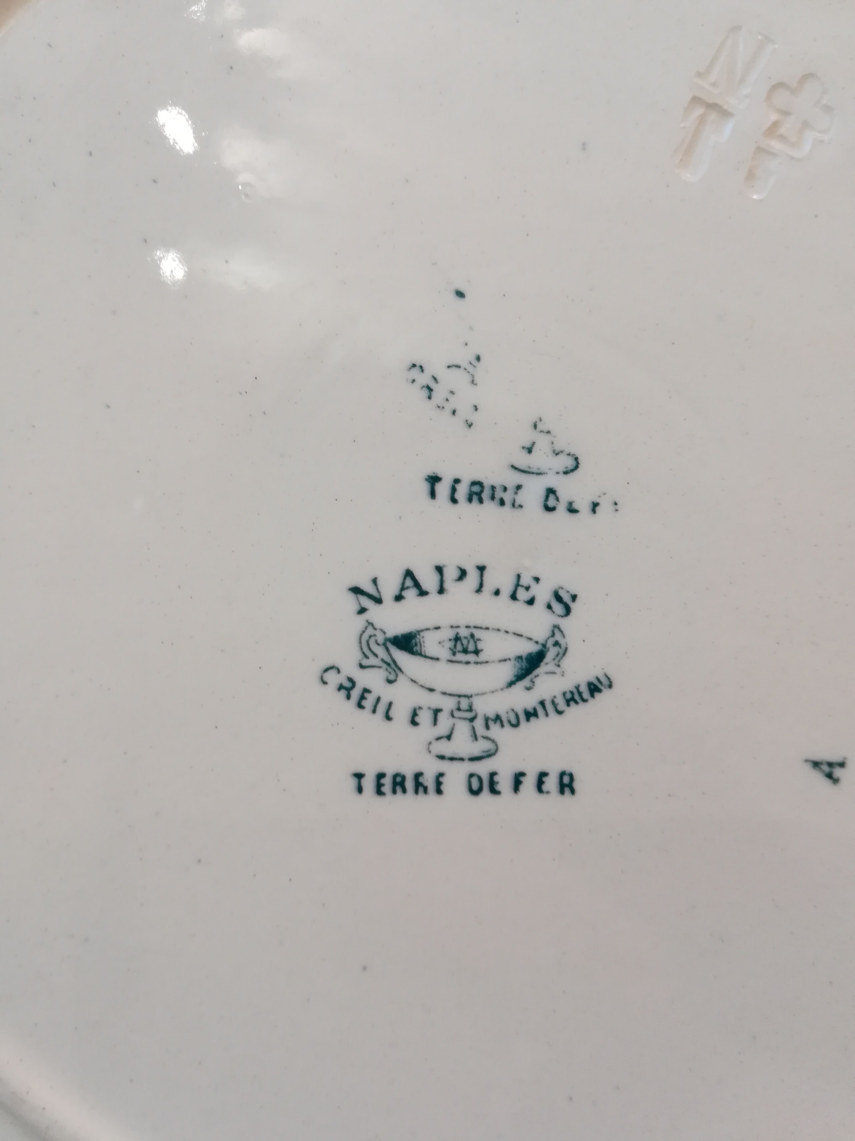 Series of 4 flat plates Terre de fer Creil et Montereau