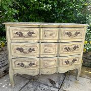 Curved antique commode in pistachio green patina.