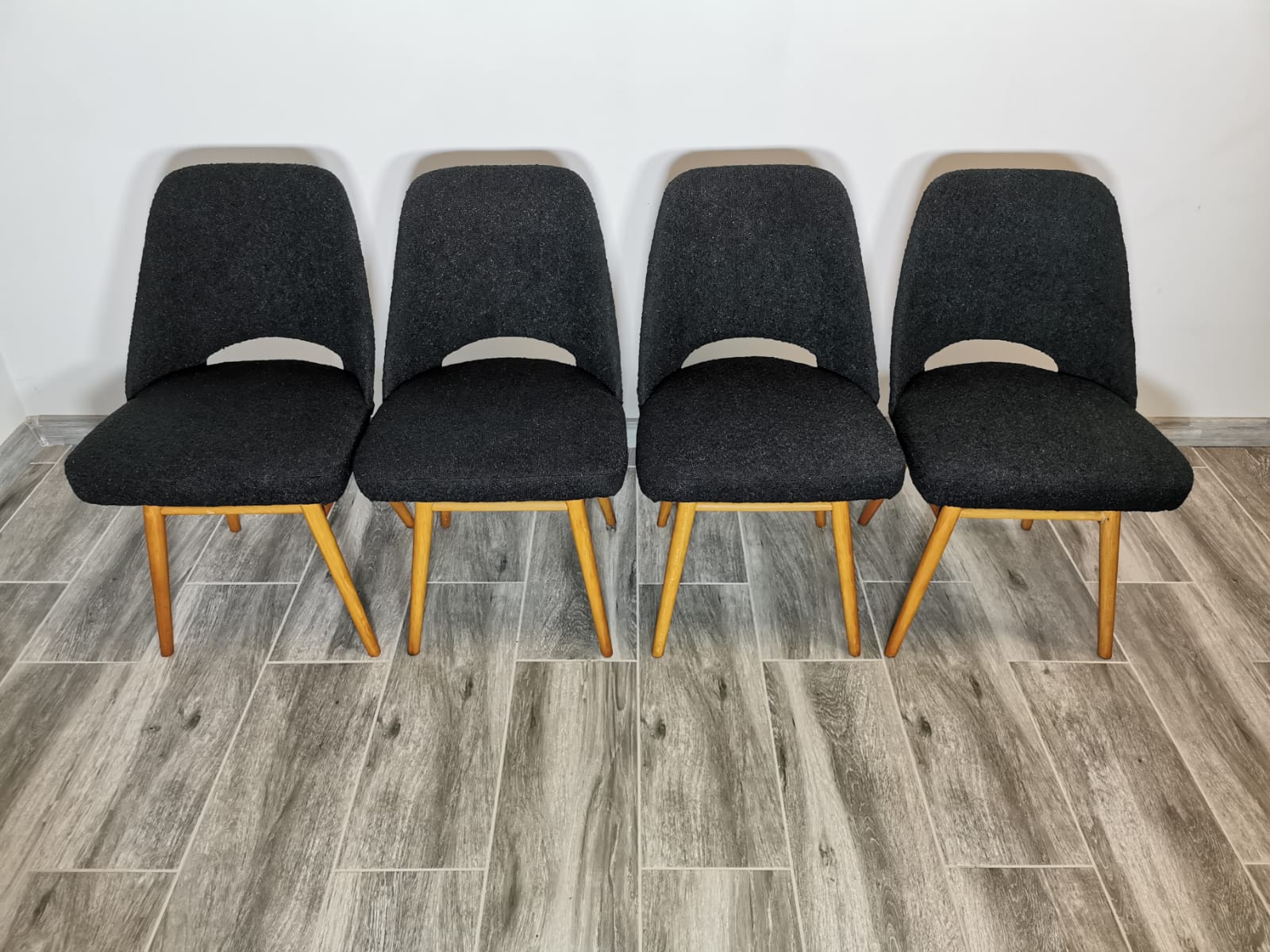 Restored dining chairs by Oswald Haerdtl