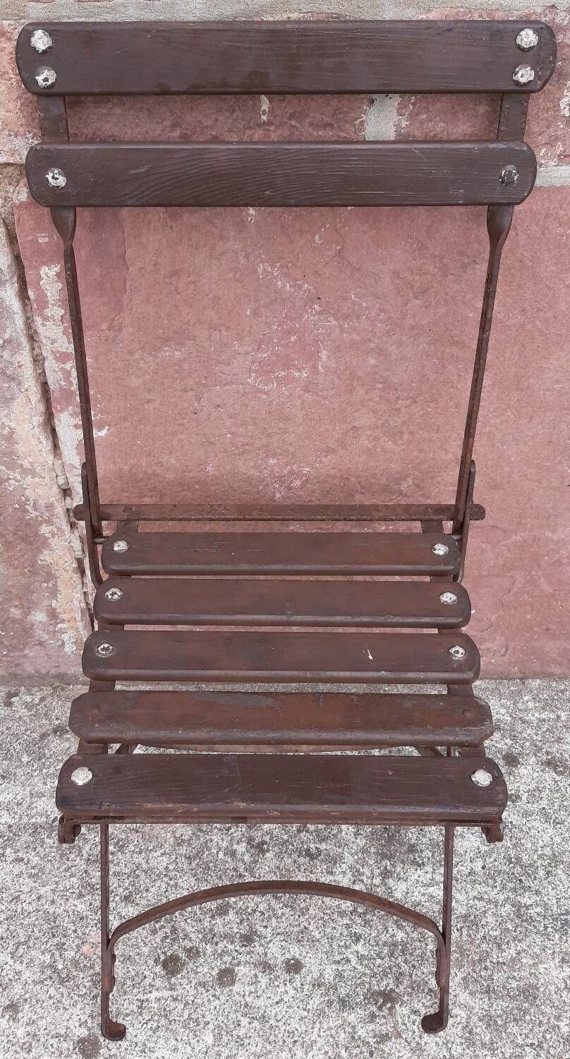 Foldable wrought iron chair