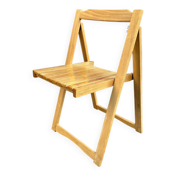 Blonde wooden folding chair in the style of Aldo Jacober.