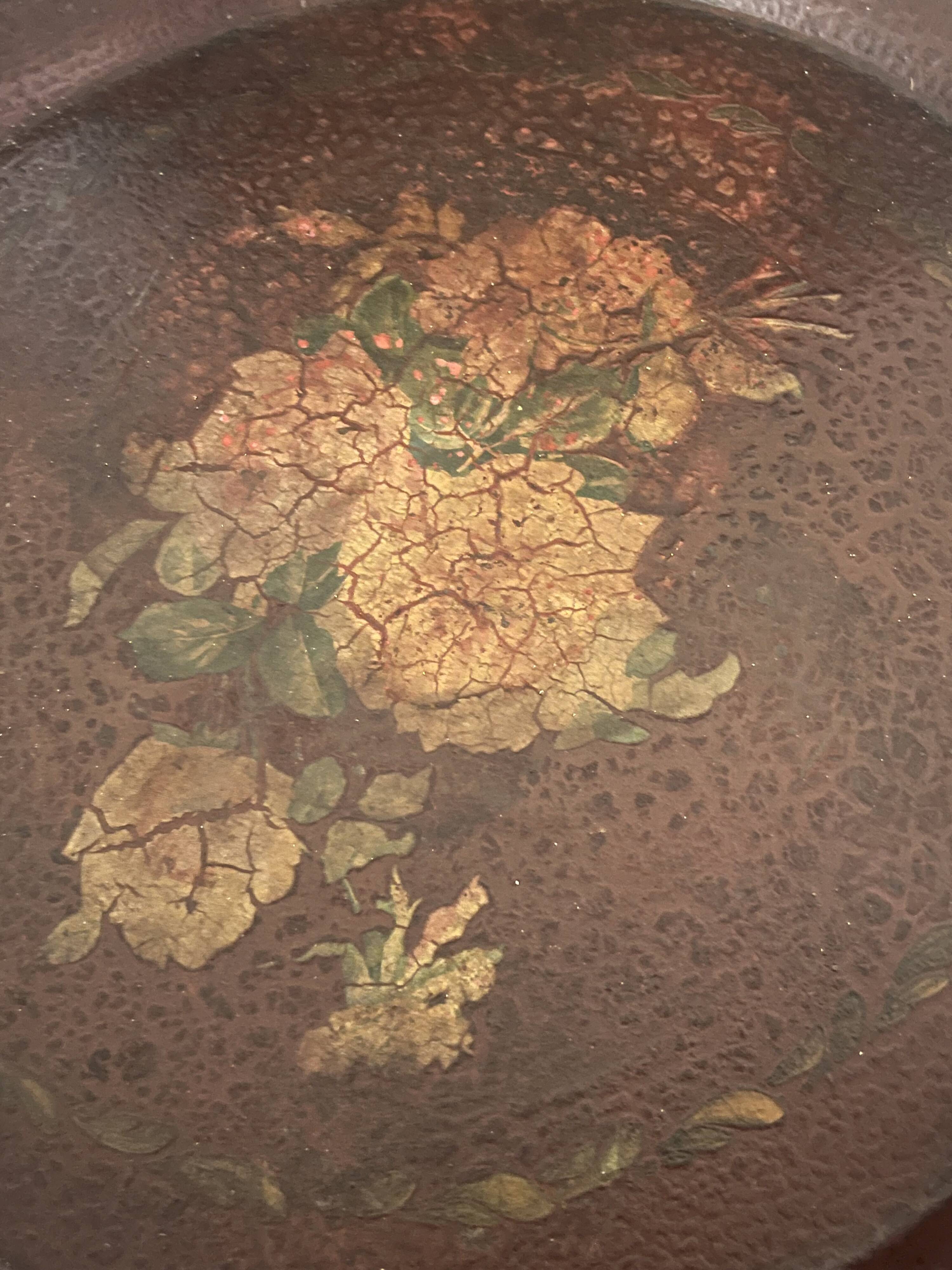 Two old trays on a stand/console.